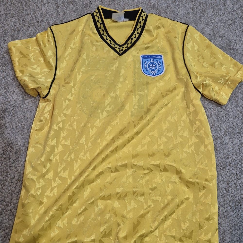 Yellow Soccer Jersey with Emblem